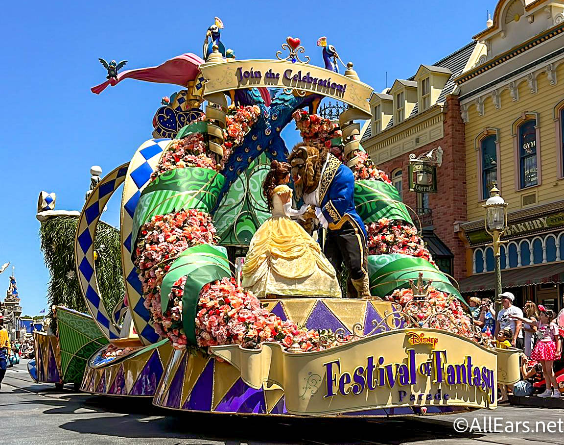 Image of the Festival of Fantasy parade going down Main Street. Photo by All Ears